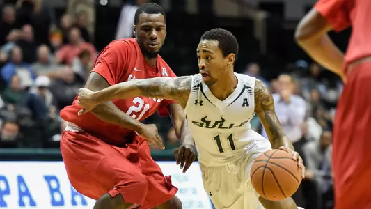 Bulls Hold On for Wild Win Over Cougars