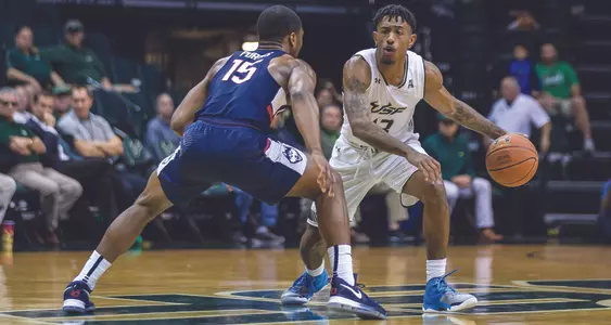 Bulls Hang Tough, Fall Late to UConn