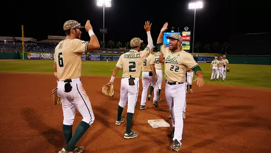 Logan Lyle and team after 2021 AAC win