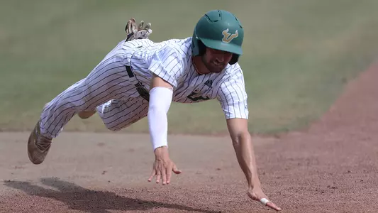 Nick Gonzalez sliding at home Houston