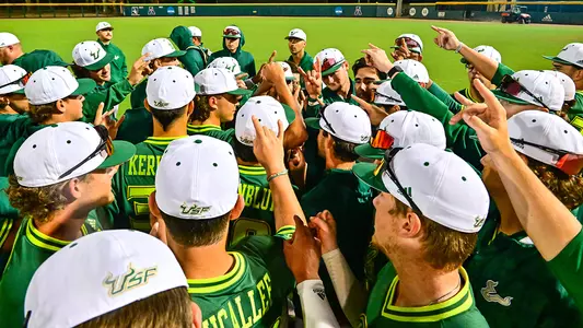 2022 BSB slime team huddle horns up