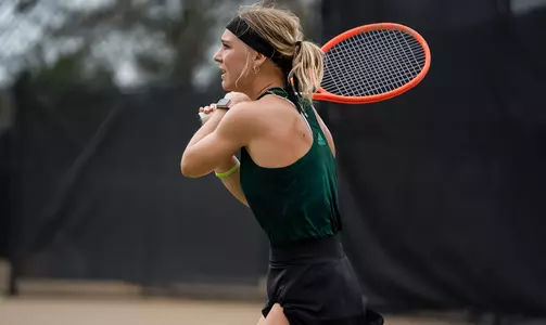 Holding tennis racquet