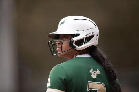 Tieley Vaughn stands in the on-deck circle with her batting helmet on.
