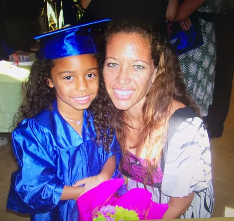 Tieley Vaughn as a child with her mother after her Pre-K graduation ceremony.