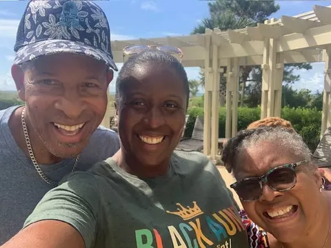 Kydani Dover with her parents.