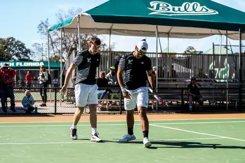 South Florida Bulls during a men's tennis match against the Florida Southern College Mocs on January 21, 2024. (Michael Shaw/South Florida Tennis)