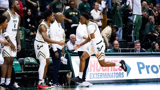 MBB CJ Brown Celebration with bench vs Tulsa