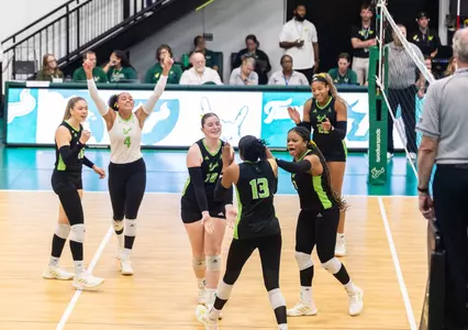 Samiha Foster Arianna Beckham Laila Ivey celebrating during the South Florida Volleyball match vs ECU on September 26, 2025.