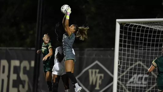 WSOC Gaby Rourke making a jumping save at No. 19 Wake Forest
