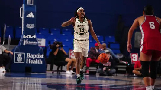 Stefanie Ingram bringing the ball up the court at FAU