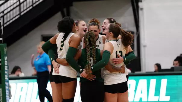 Volleyball in-game huddle during Charlotte