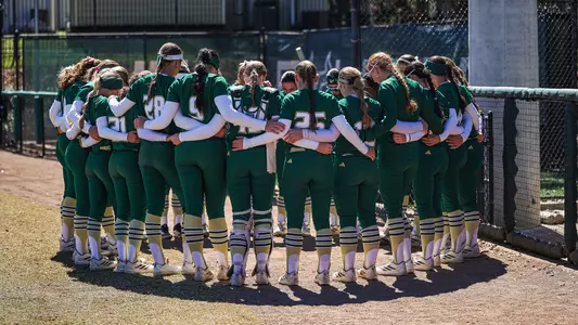 Softball team huddle vs Indiana 2-23-26