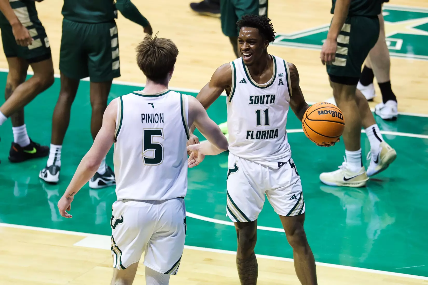 Joseph Pinion, CJ Brown during the South Florida Men's Basketball match vs Charlotte on March 8, 2026.