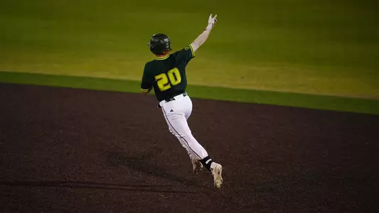 Lance Trippel rounds the bases after hitting a two-run home run.