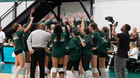 Volleyball team huddle pre match vs TCU