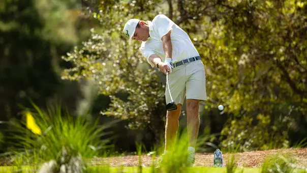 Jackson Spybey teeing off at the FAU Invite