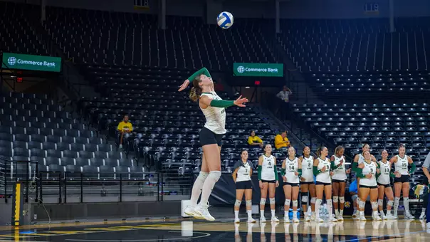 Paula Tomasa serving against Wichita State