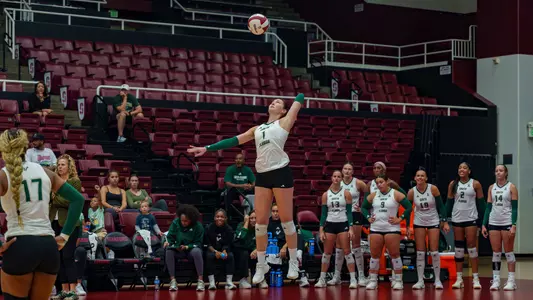 Paula Tomasa serving against Marquette