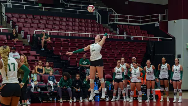 Paula Tomasa serving against Marquette