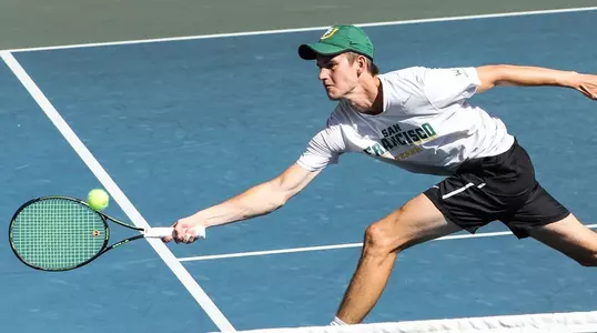 Nils reaching for ball