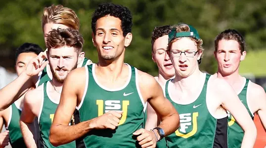 Men's squad running in pack