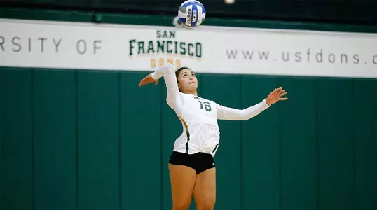 Camille Araujo takes a serve for the Dons
