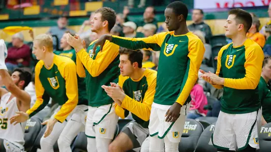 USF-Dons-Mens-Basketball-Bench-celebrating