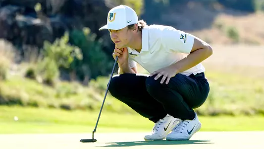 Toby-Briggs-USF-Dons-Mens-Golf-putting