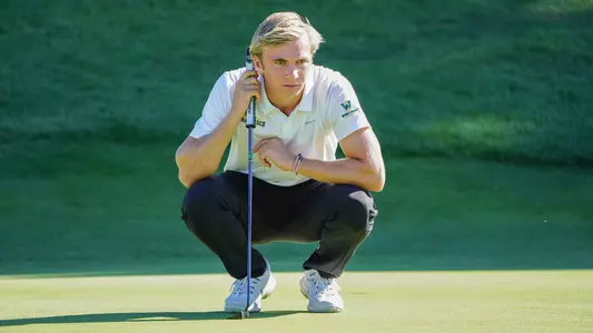 Christoffer-Palsson-USF-Dons-Mens-Golf-putting