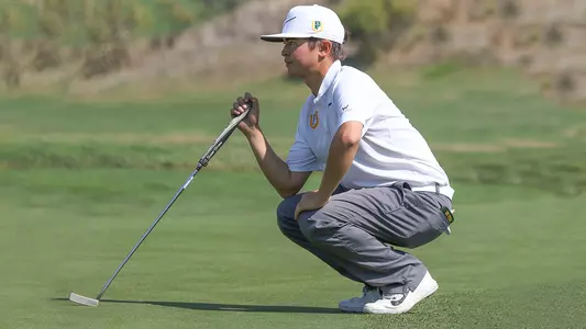 Jalen-Griffin-USF-Dons-mens-golf-putting