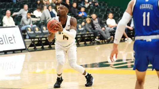 Charles Minlend Shoots a Three against Hampton