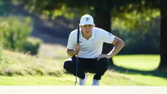 Toby-Briggs-USF-Dons-Mens-Golf-putting