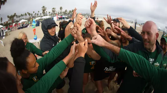 Beach Volleyball Huddle at WCC Championship 4-19-19