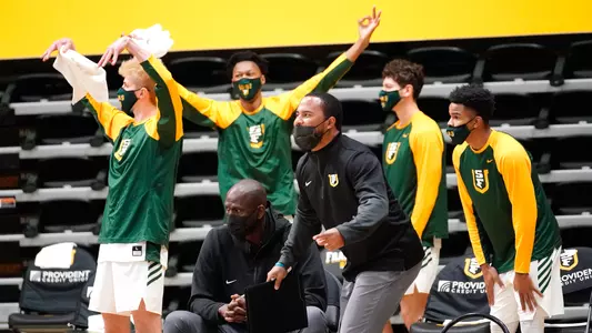 The Dons bench celebrates against Long Beach State