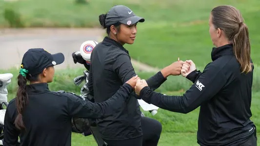 Jade + Doell Fist Bump