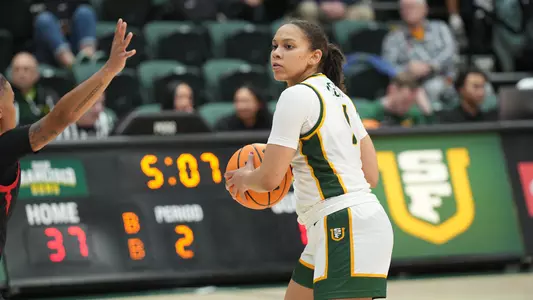 Luana Leite holding the ball