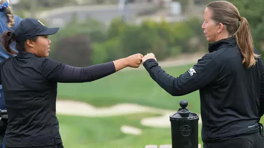 Shang + Doll Fist Bump