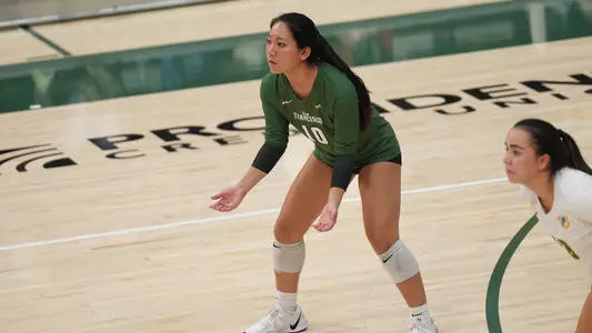 Jamie Low waiting for a serve vs. Air Force