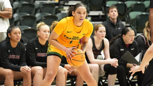 Luana Leite holding the ball vs. Santa Clara