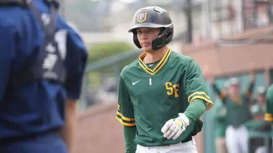 Lane Oliphant walking to the plate