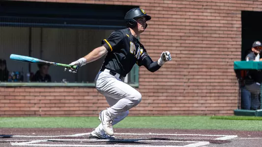 Blake Pitts swinging vs. PAcific