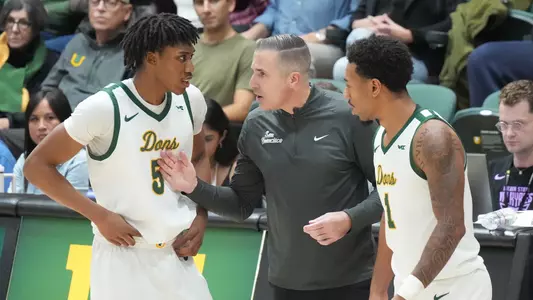 Chris Gerlufsen with Tyrone Riley IV + Malik Thomas