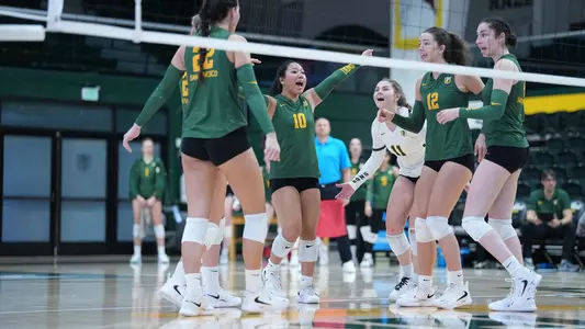 Jamie Low and team celebrating a point vs. Oregon State 2025