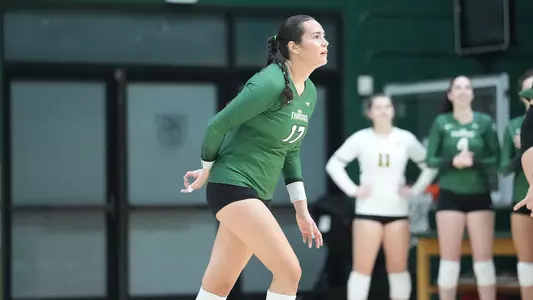 Crystal Galaviz waiting for a serve vs. Santa Clara