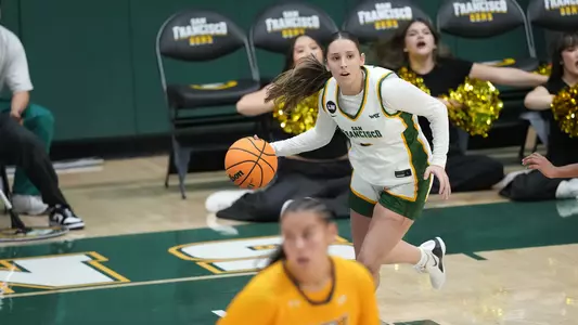 Mara Neira dribbling vs. UNCG 2025