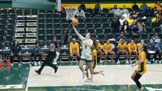 Aina Cargol driving layup vs. UNCG 2025