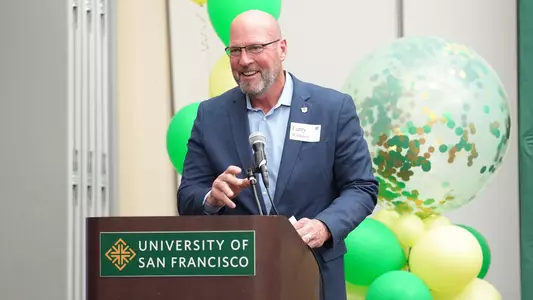 Larry Williams Smiling at Tip-Off Reception October 2025