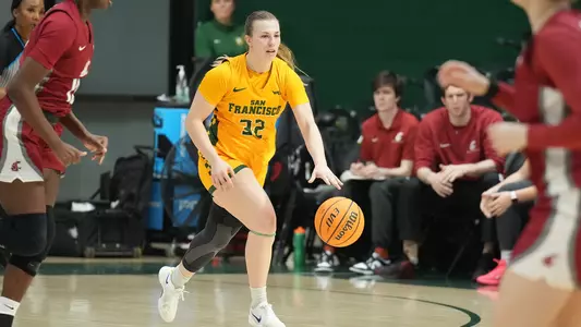 Cami Fulcher dribbling up court vs. WSU