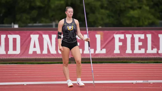 Lilly Gerhard holding a javelin