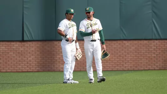 Kenny DeCelle and Jordan Lewis in the outfield vs. Sac State